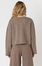 A luxurious ribbed material cardigan, in a lovely chocolate brown color, with a button down front.