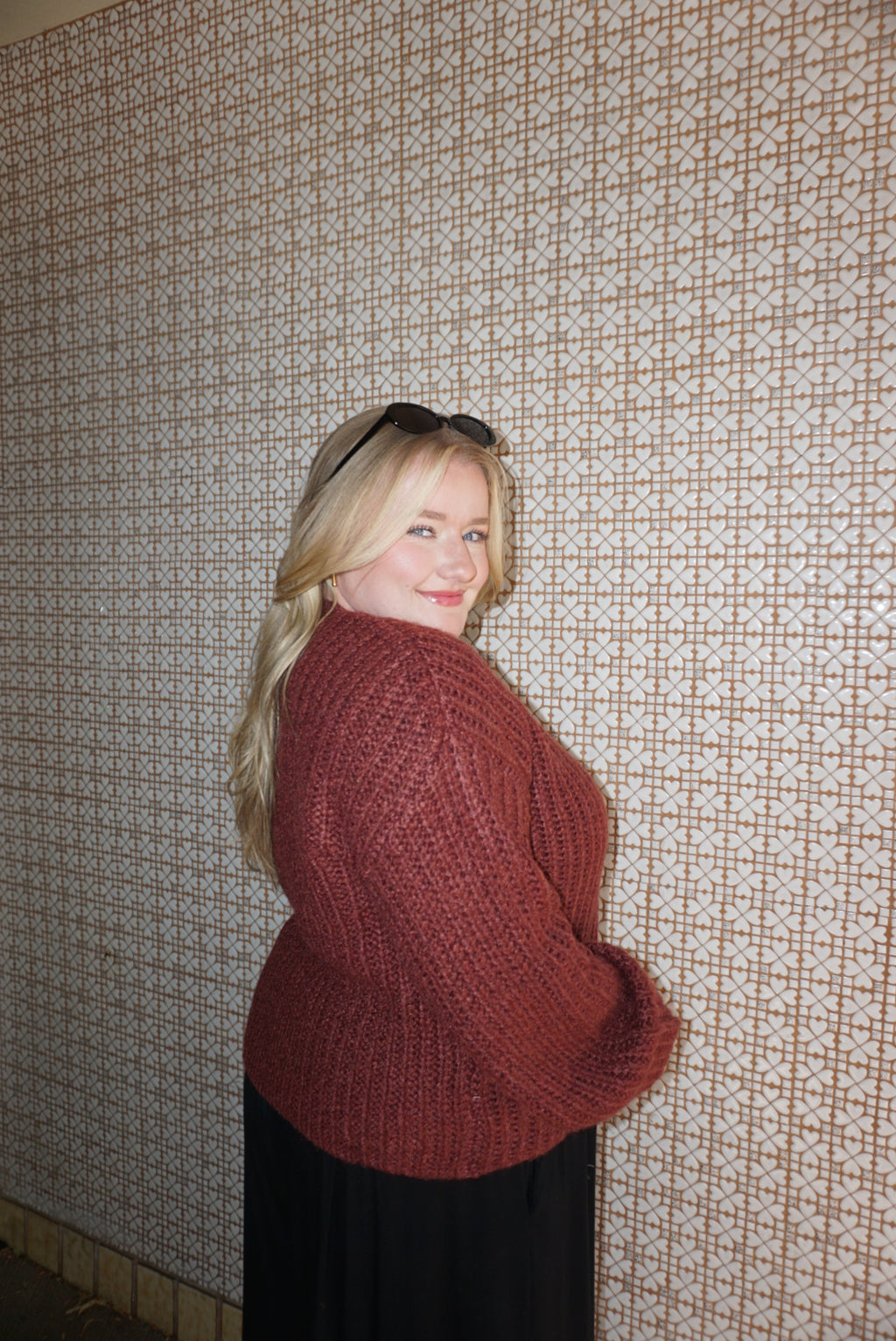 A cozy chunky knit burgundy sweater. 