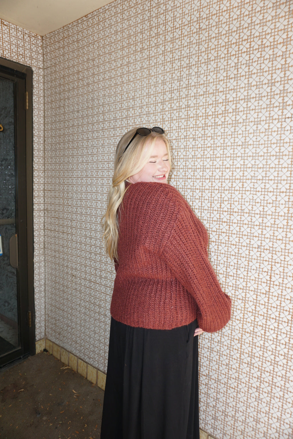 A cozy chunky knit burgundy sweater. 
