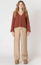 A cozy chunky knit burgundy sweater. 