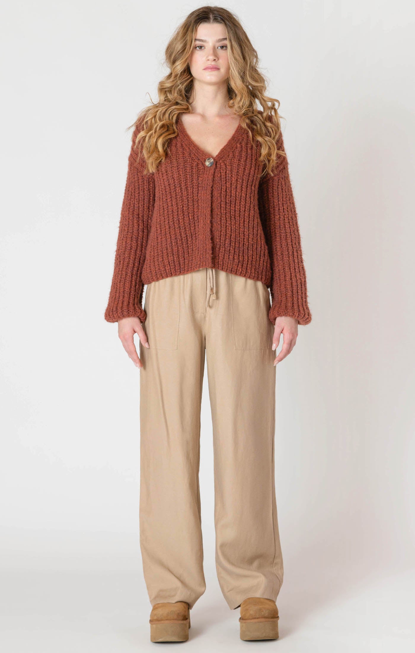A cozy chunky knit burgundy sweater. 