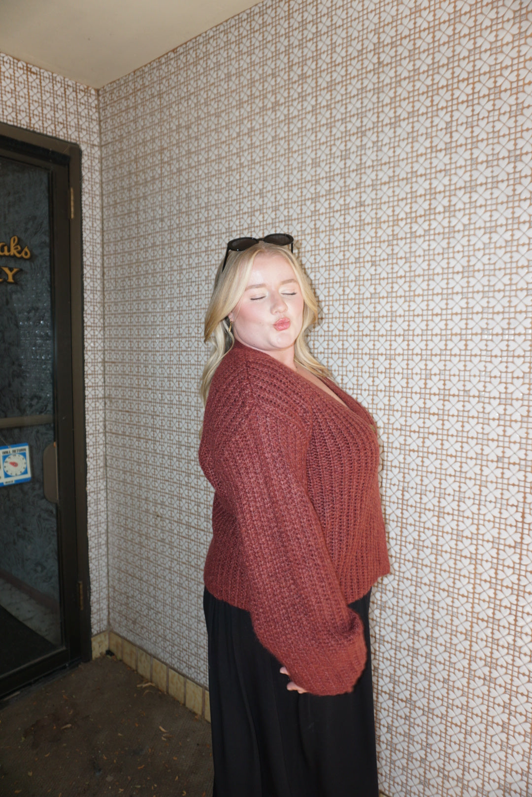 A cozy chunky knit burgundy sweater. 