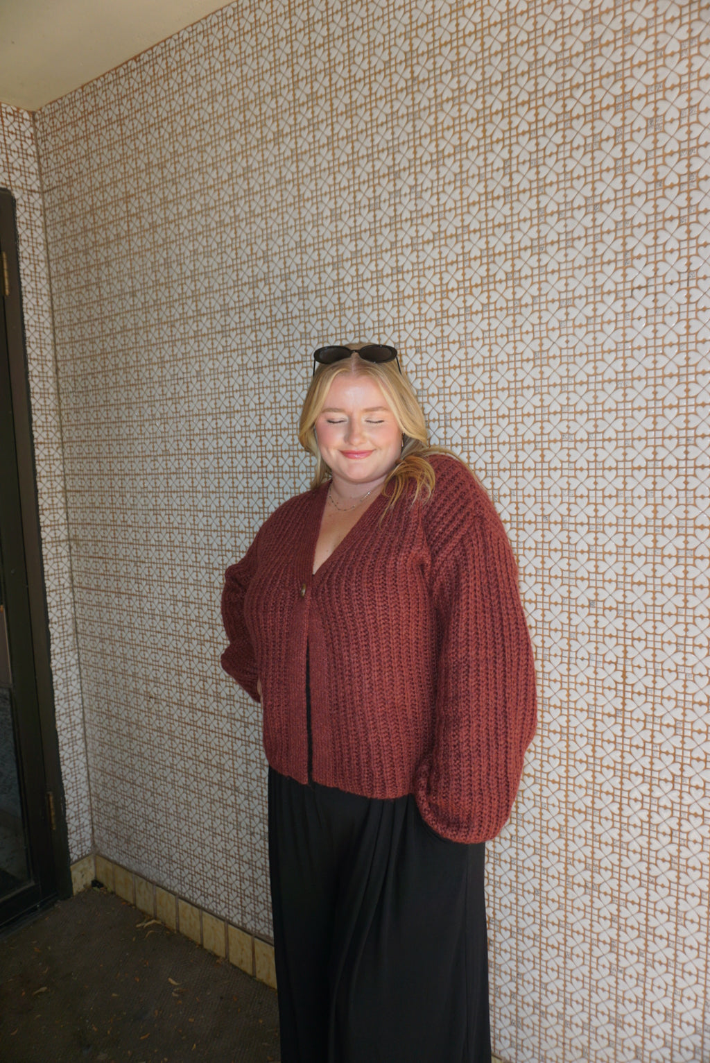 A cozy chunky knit burgundy sweater. 