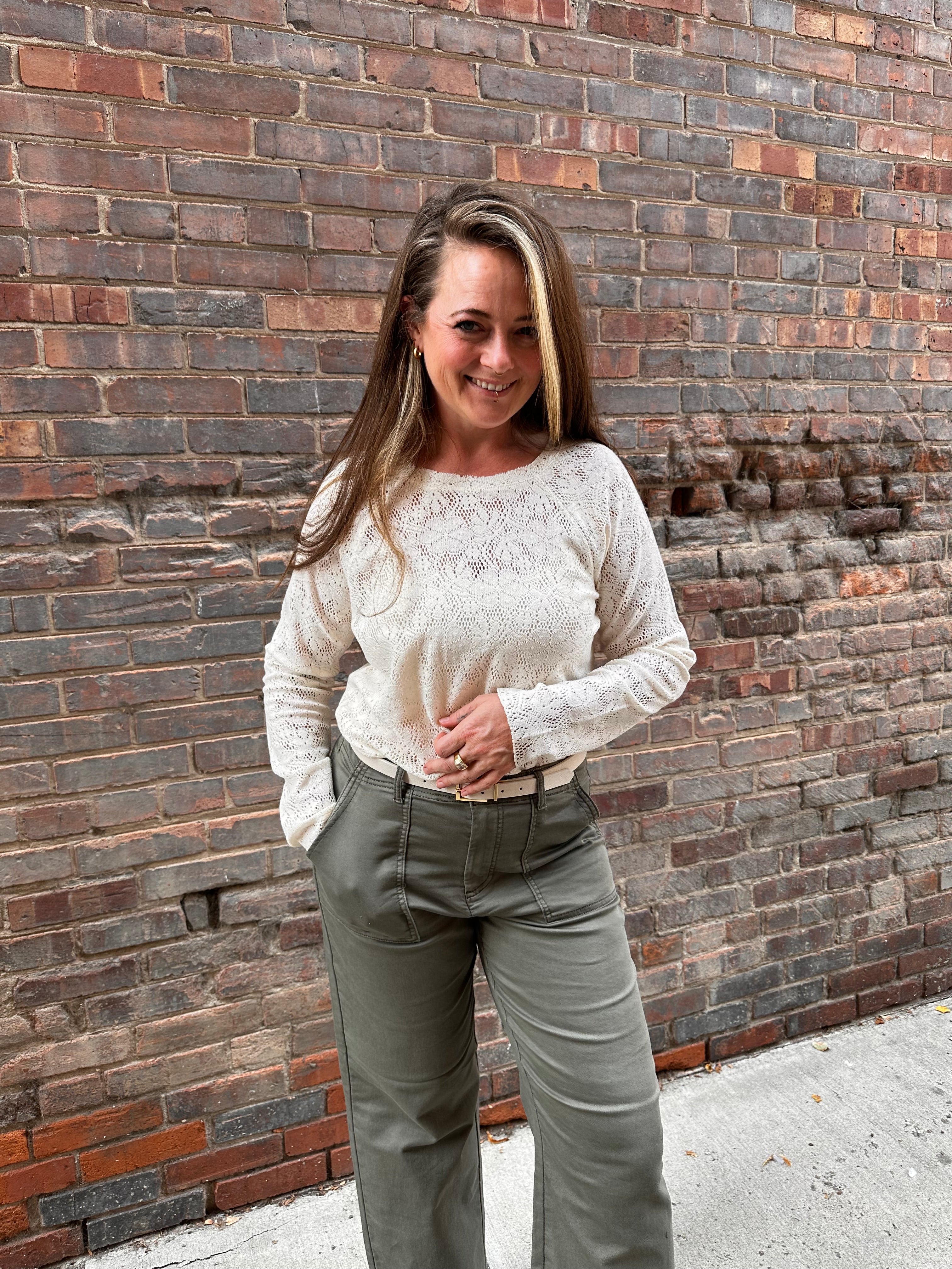 A cream lace long sleeve shirt