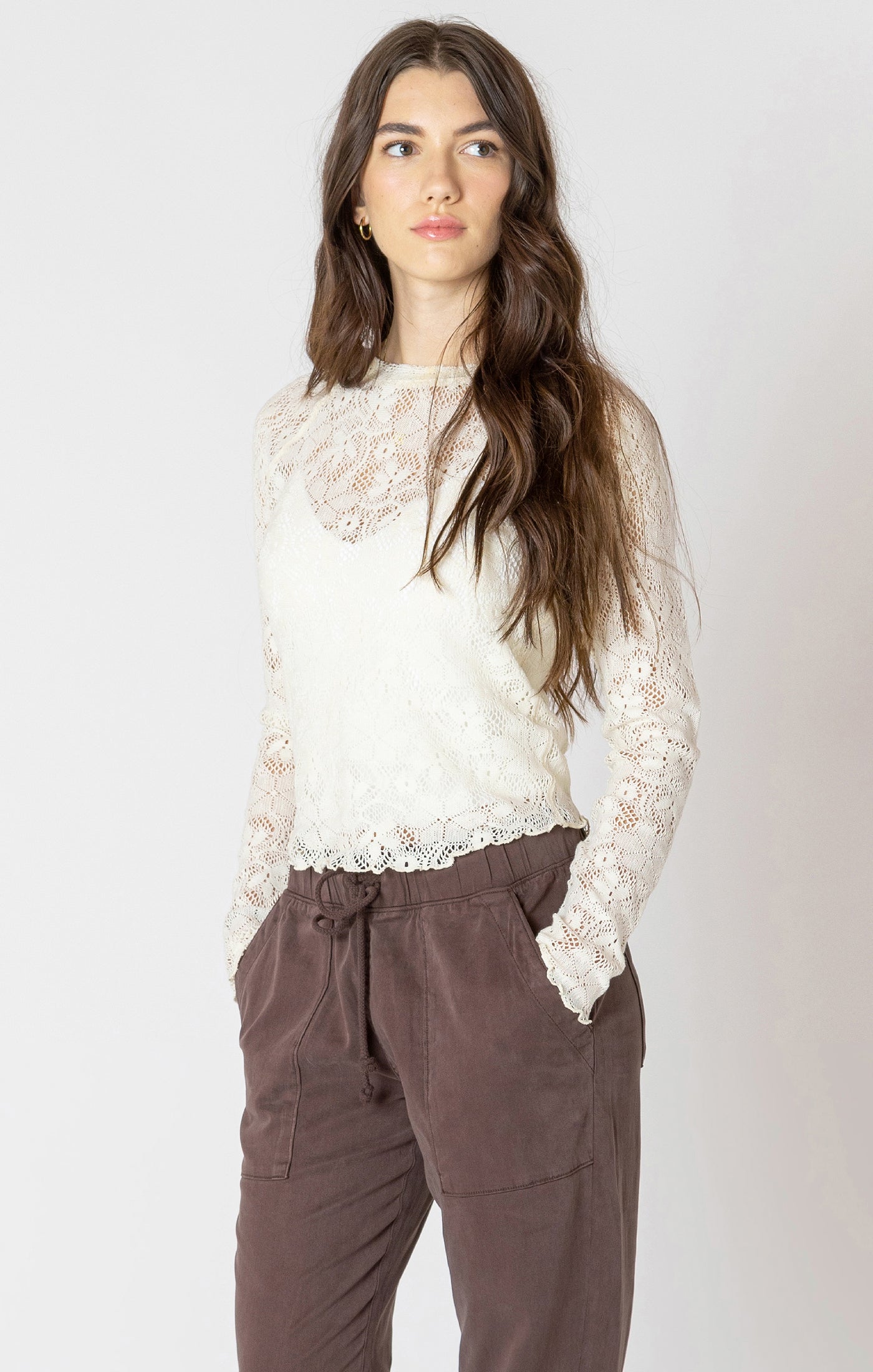 A cream lace long sleeve shirt