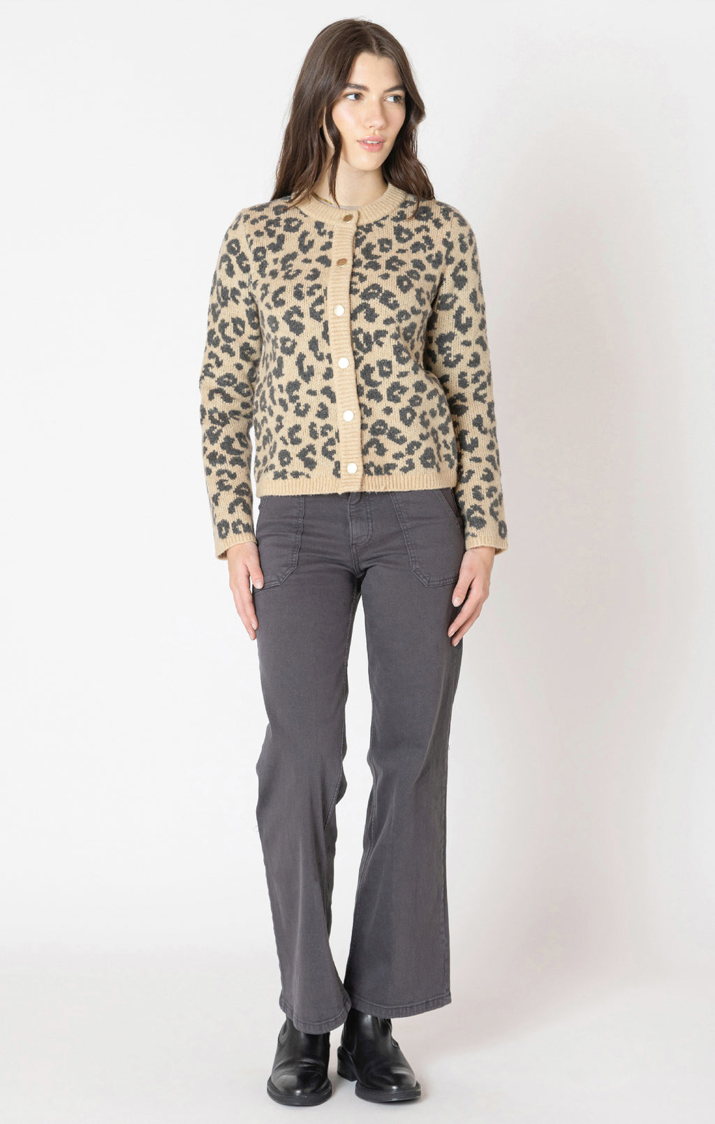 A tan cardigan with grey/black leopard print detail, with a button down front. 