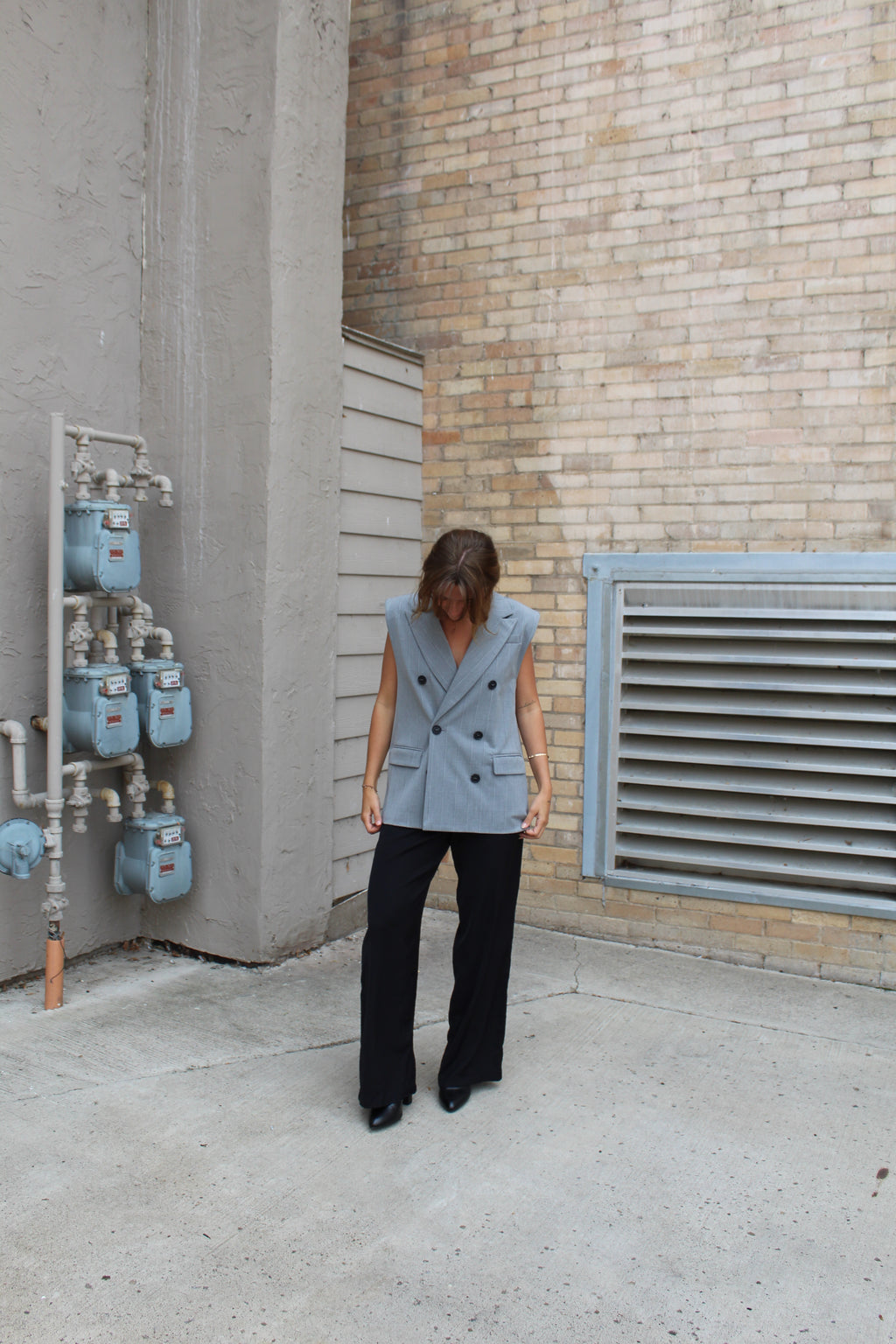 A grey suit jacket vest 