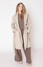 Oatmeal colored hooded trench coat jacket with a tie waist, and button front.