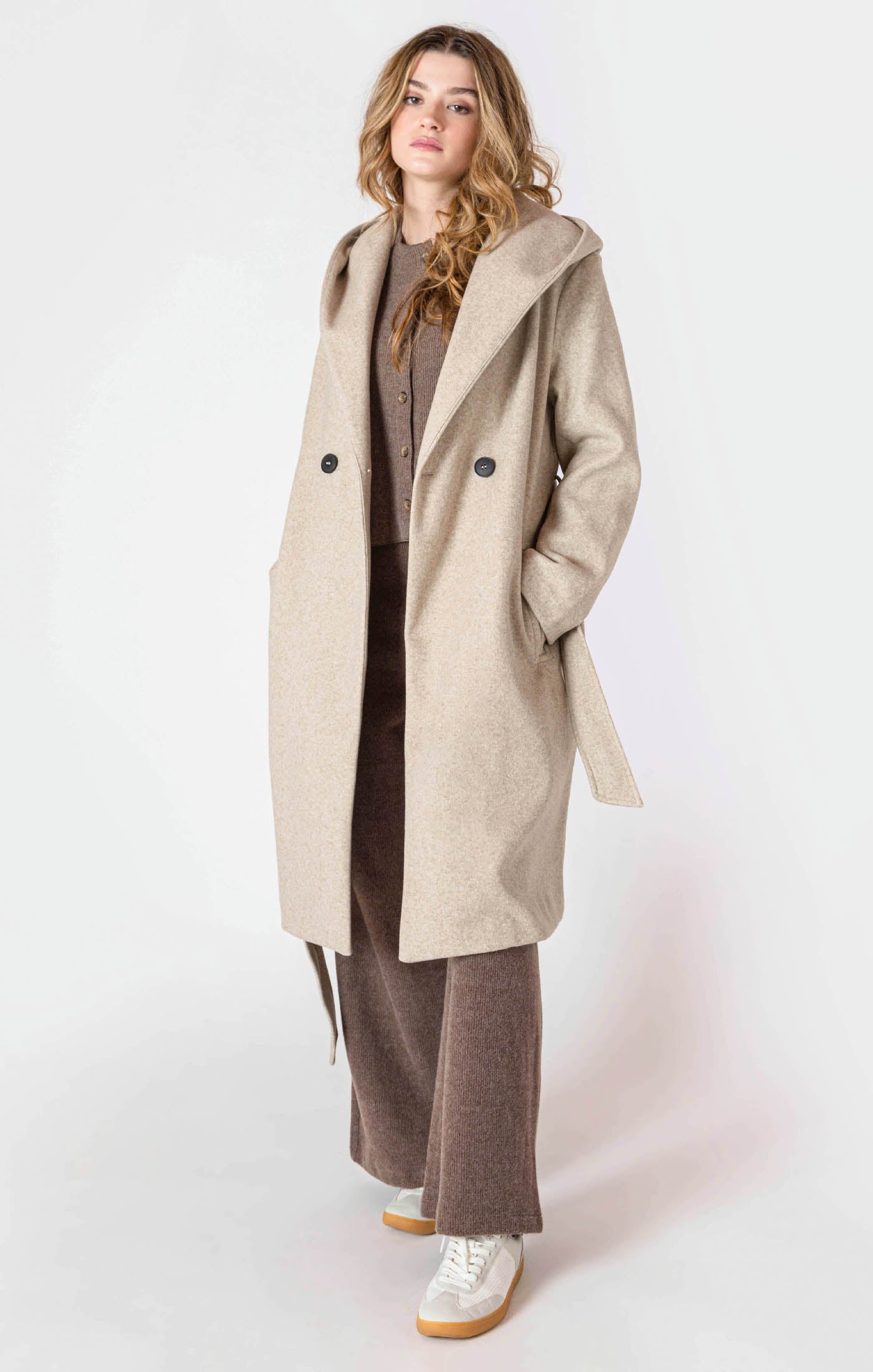 Oatmeal colored hooded trench coat jacket with a tie waist, and button front.