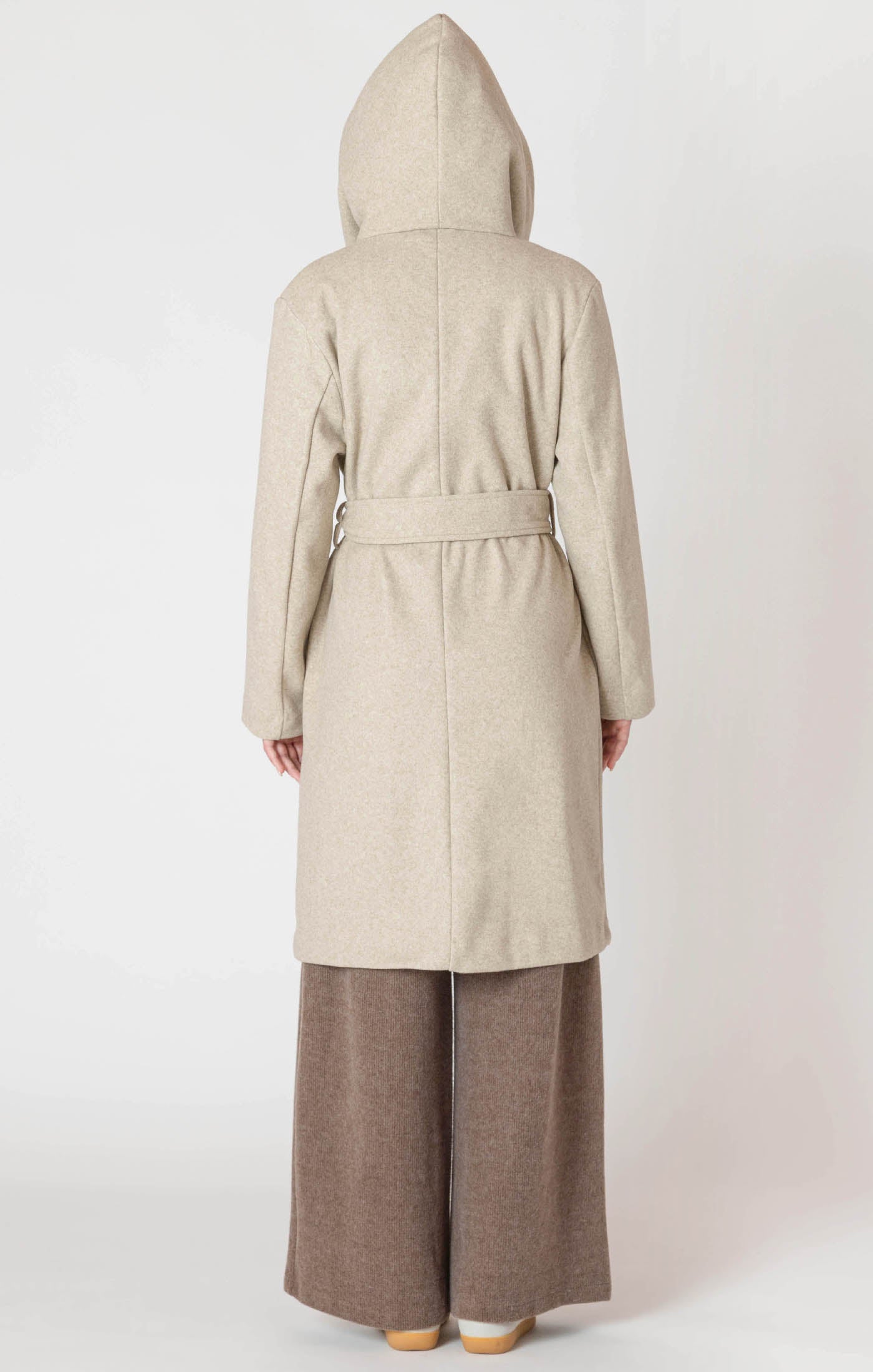 Oatmeal colored hooded trench coat jacket with a tie waist, and button front.