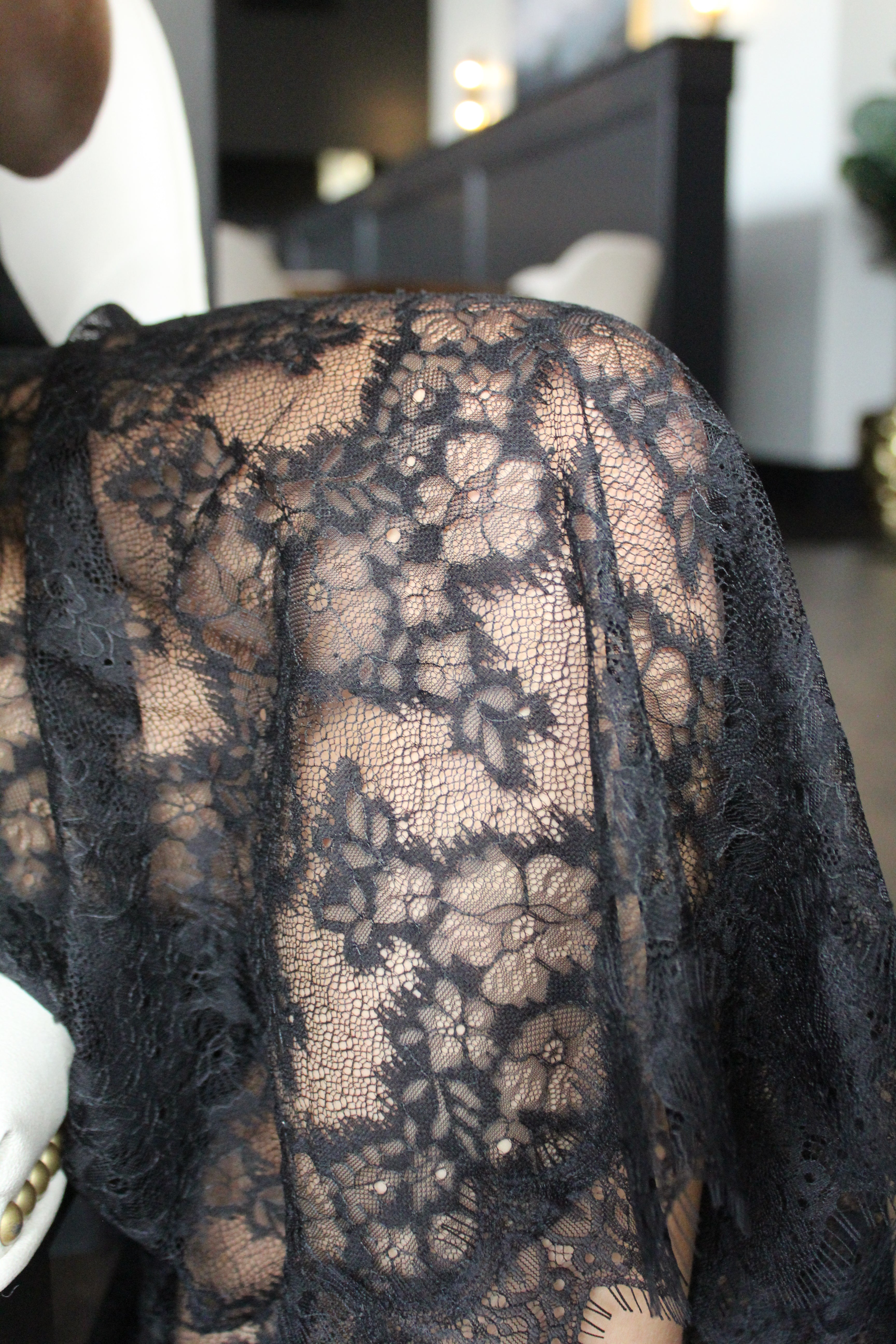 Black lace detail of bottom half of the skirt.