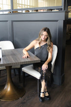 A beautiful black satin skirt with lace bottom.