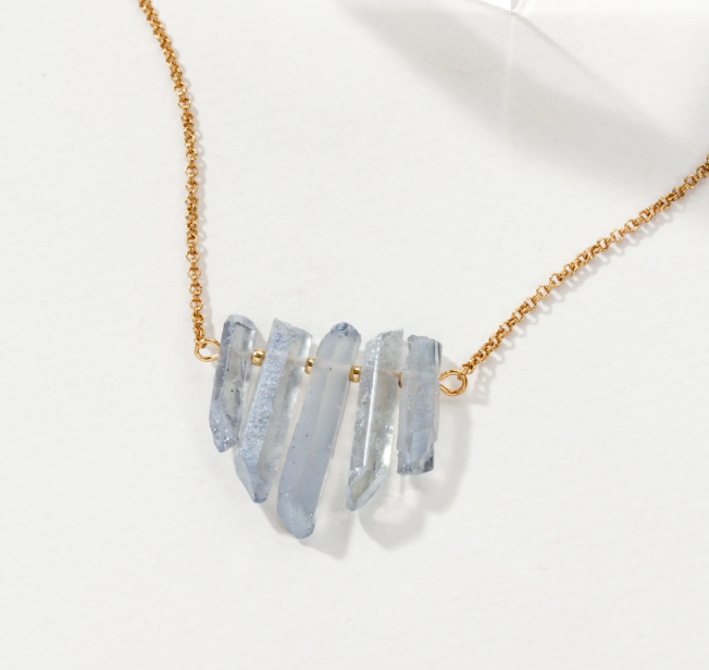 Necklace with blue stone pendants on a dainty gold chain