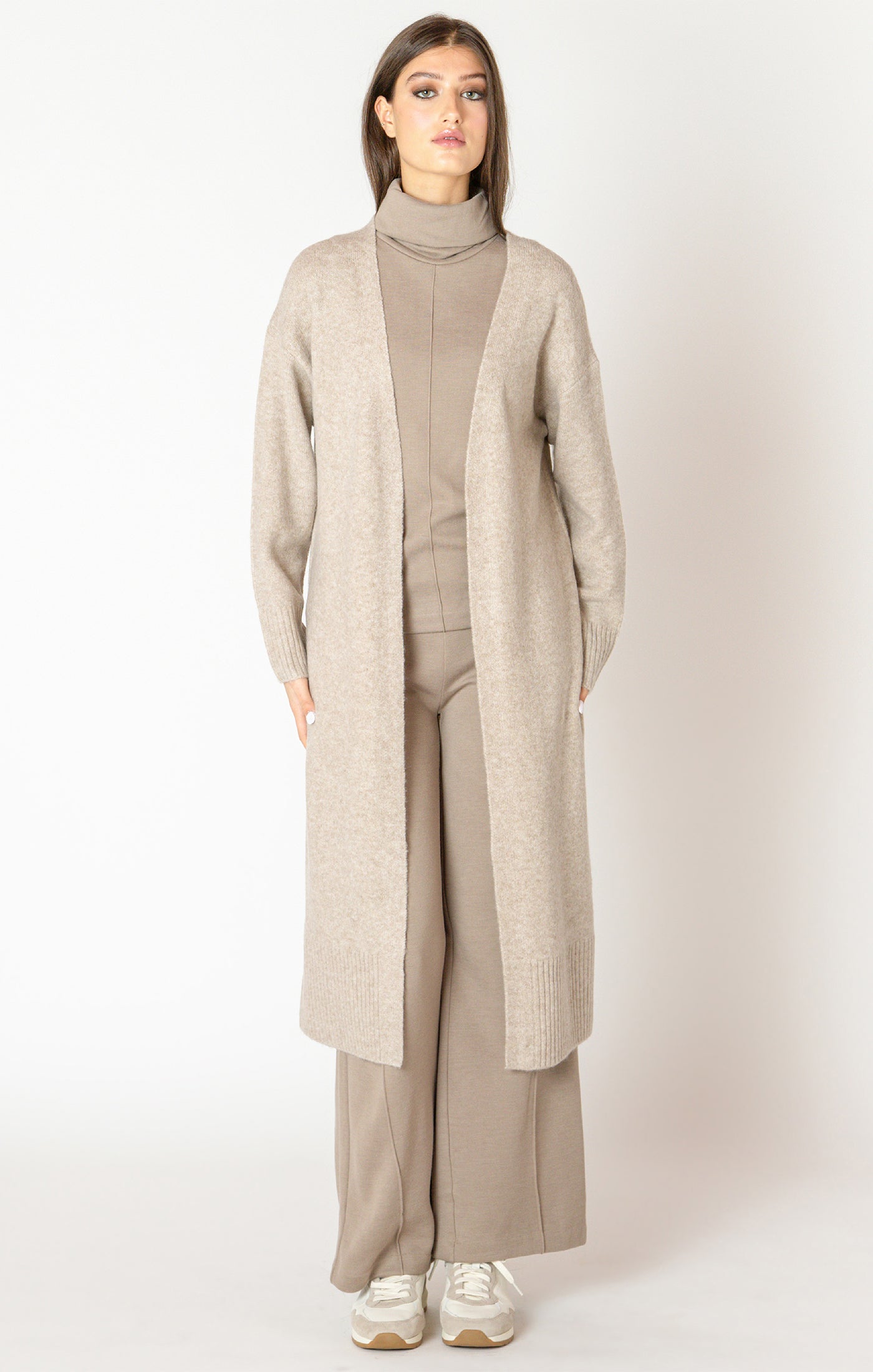 An elegant calf length open front sweater in a lovely oat color