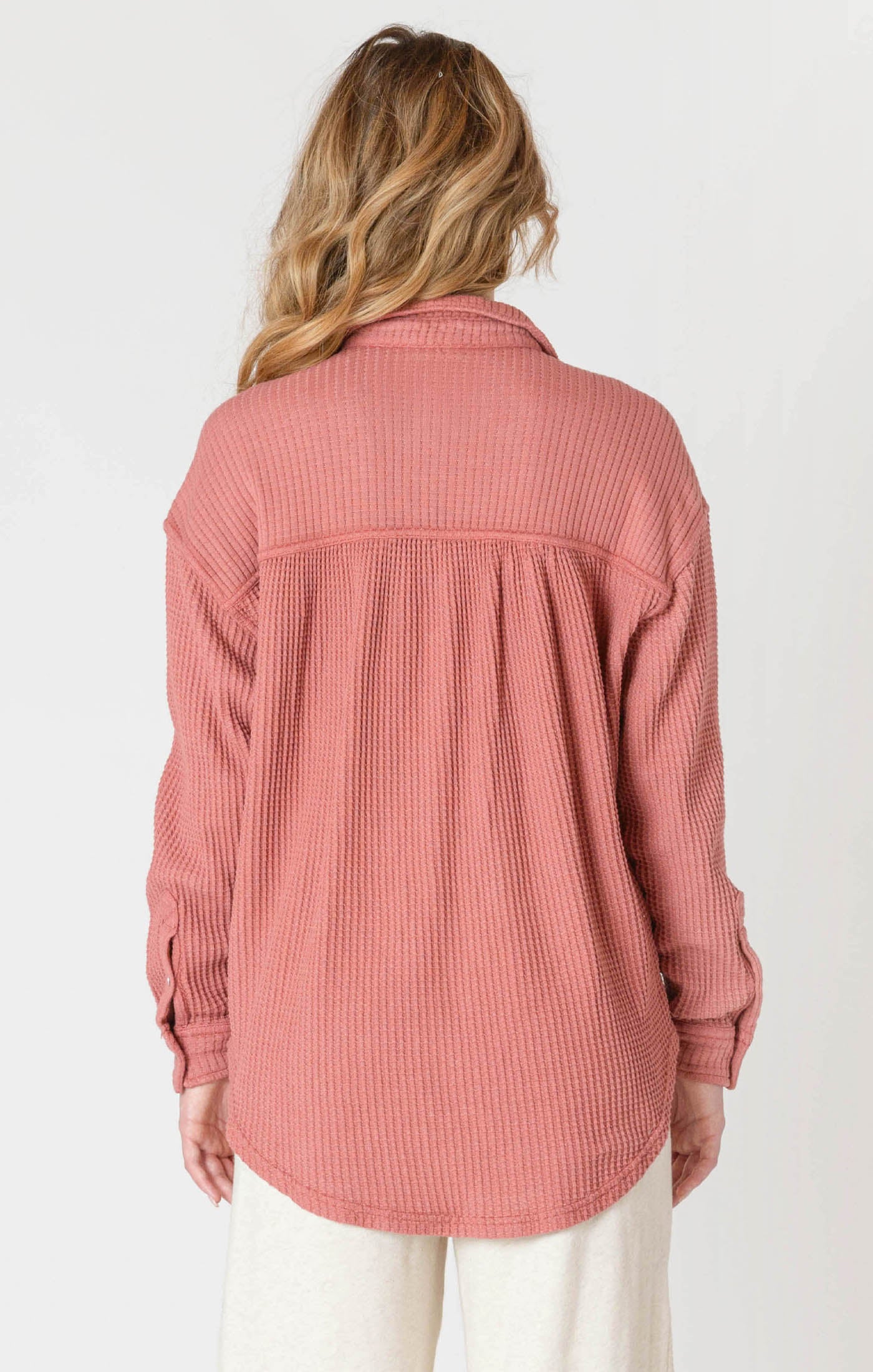 A wonderfully soft button up jacket, in a light weight waffle material, available in cream, dusty pink, or charcoal.
