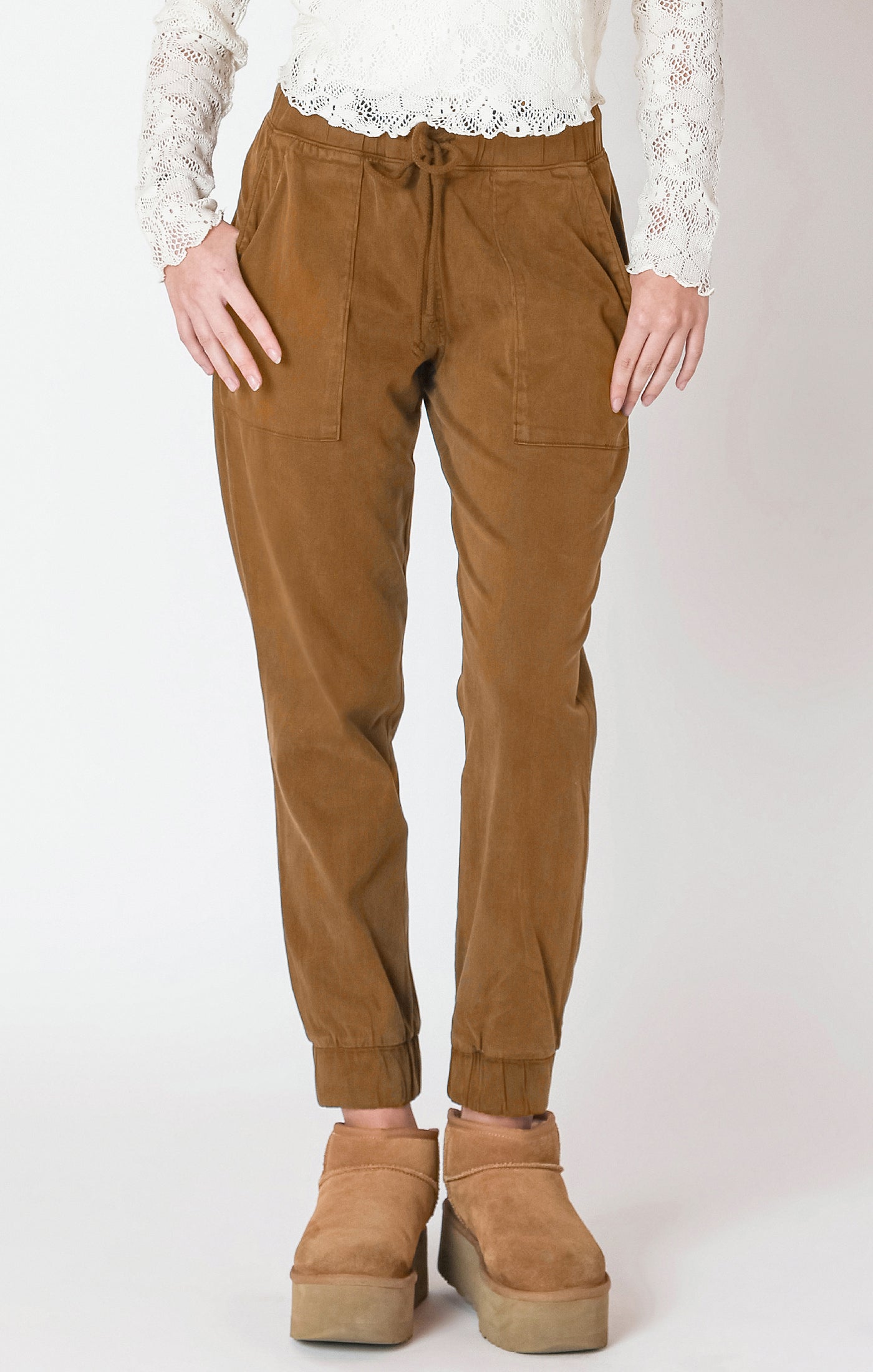 Super cute denim material joggers, in a fall ready toffee color, with a tie waste.