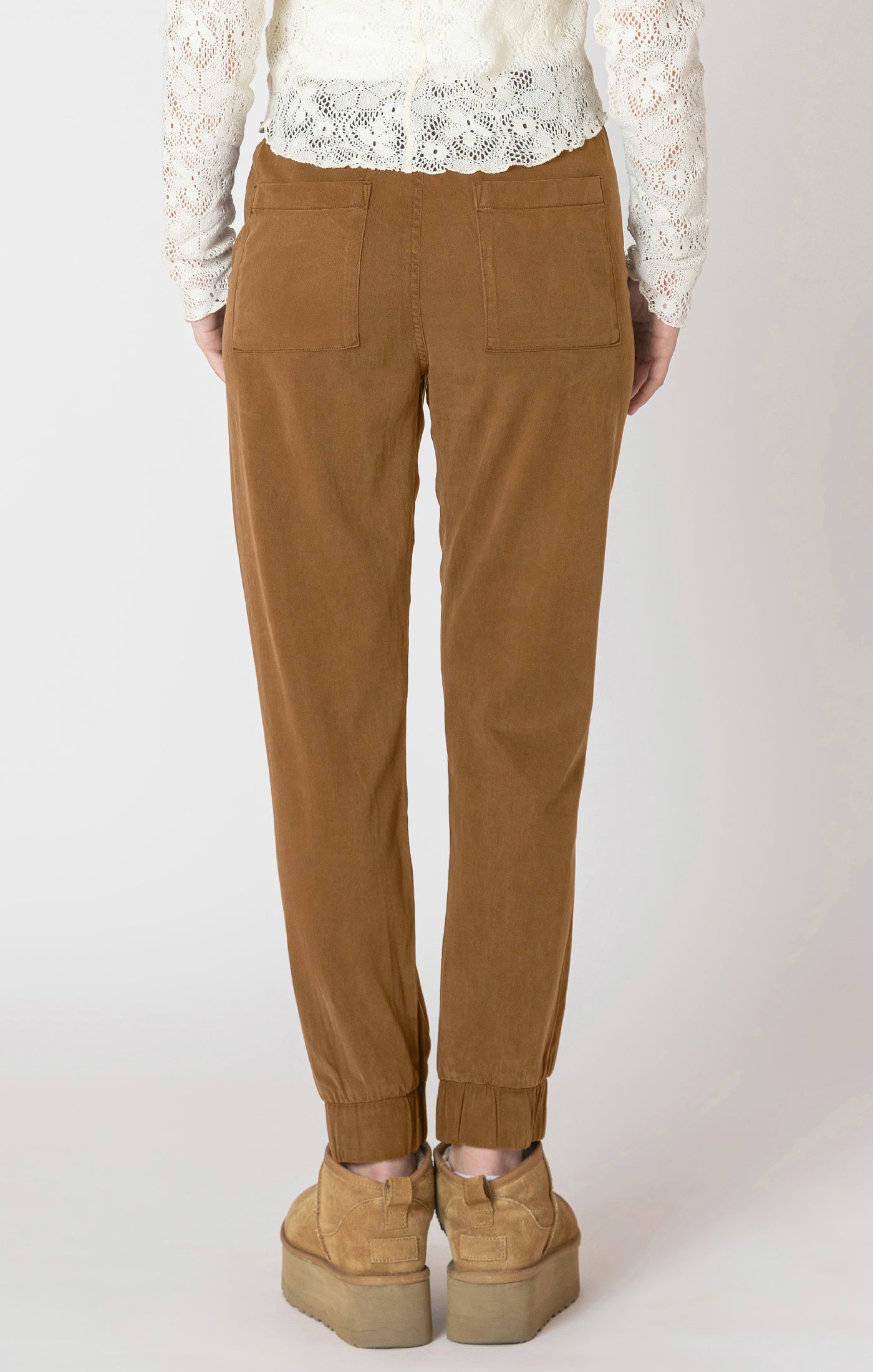 Super cute denim material joggers, in a fall ready toffee color, with a tie waste.