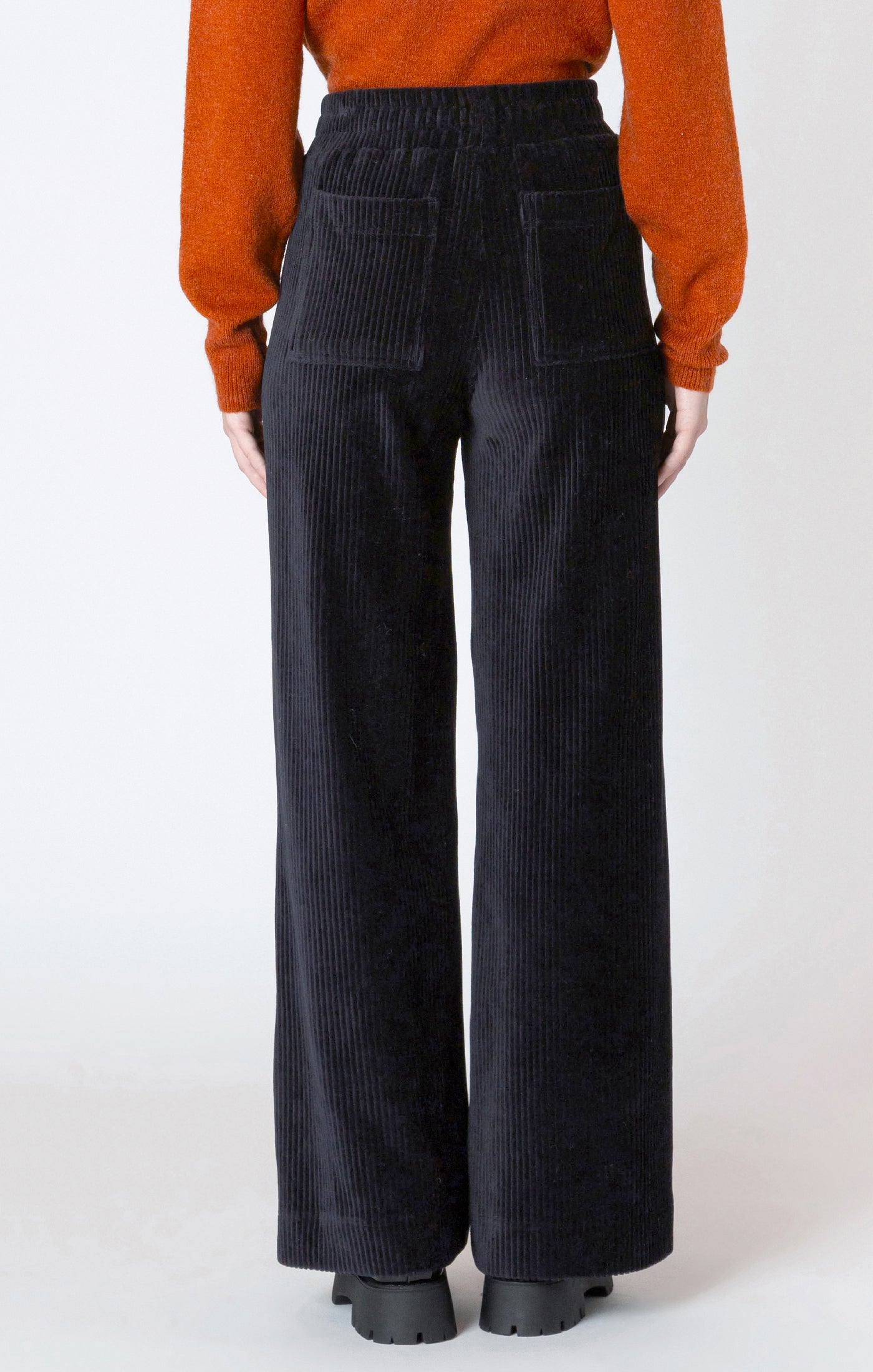 Black high waisted corduroy pants.