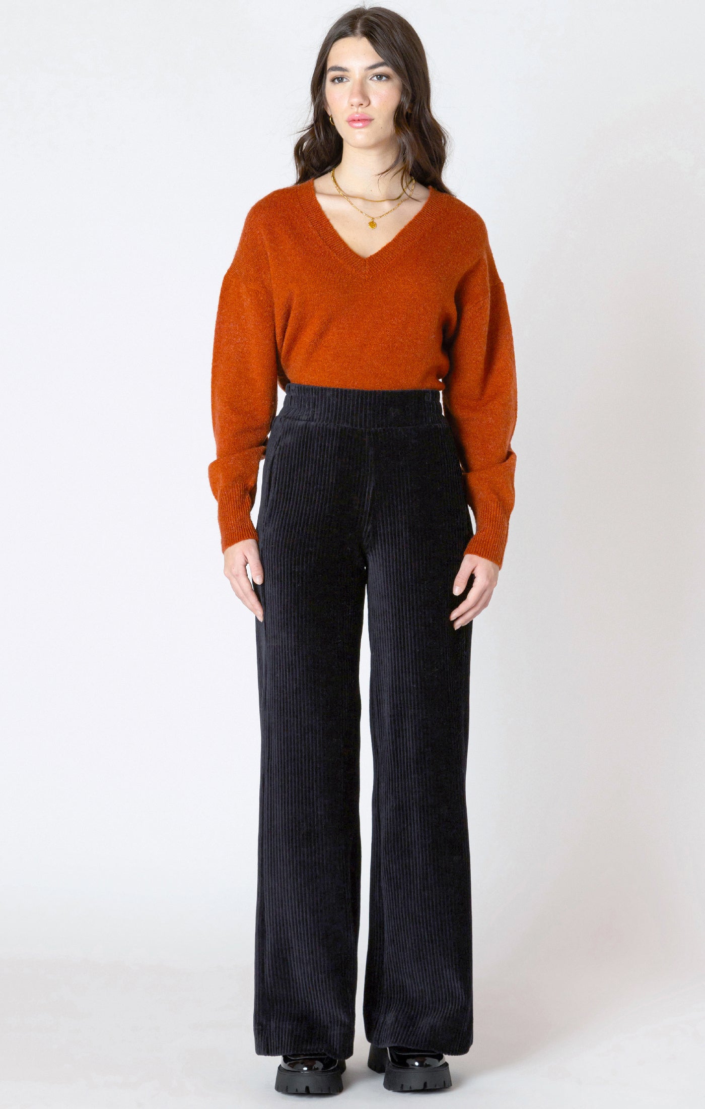 Black high waisted corduroy pants.