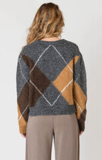 A cozy argyle sweater, with charcoal, tan, brown, and white colors, creating a timeless piece perfect for chilly winter days.