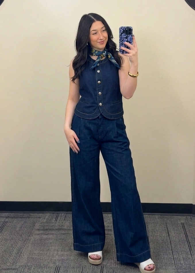 A woman wearing a matching Denim set with wide leg trouser denim pants.