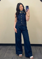 A woman wearing a matching Denim set with wide leg trouser denim pants.