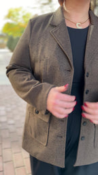 brown blazer on a woman