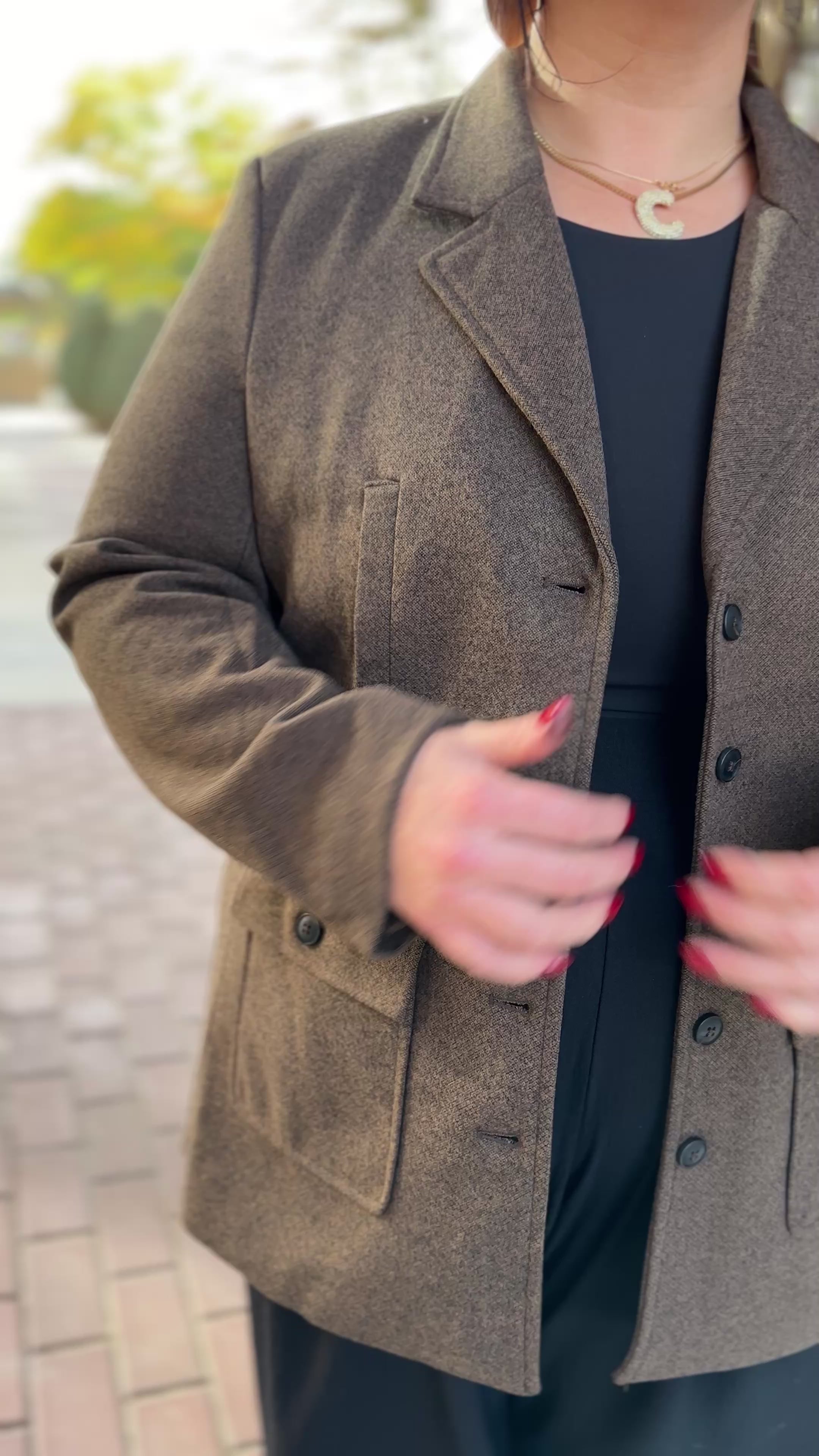brown blazer on a woman