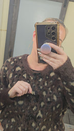 Fuzzy leopard print sweater with beaded bow buttons