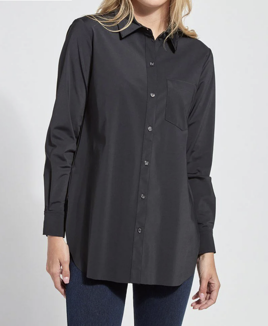 Black button-up shirt worn by a person on a light gray background
