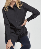 Person wearing a black long-sleeve shirt with a pocket on a white background